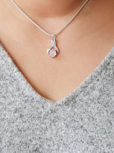 Raw Rose Quartz 8-shaped Pendant - raw carat
