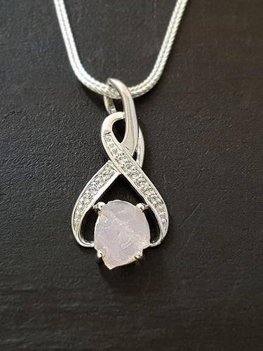 Raw Rose Quartz 8-shaped Pendant - raw carat